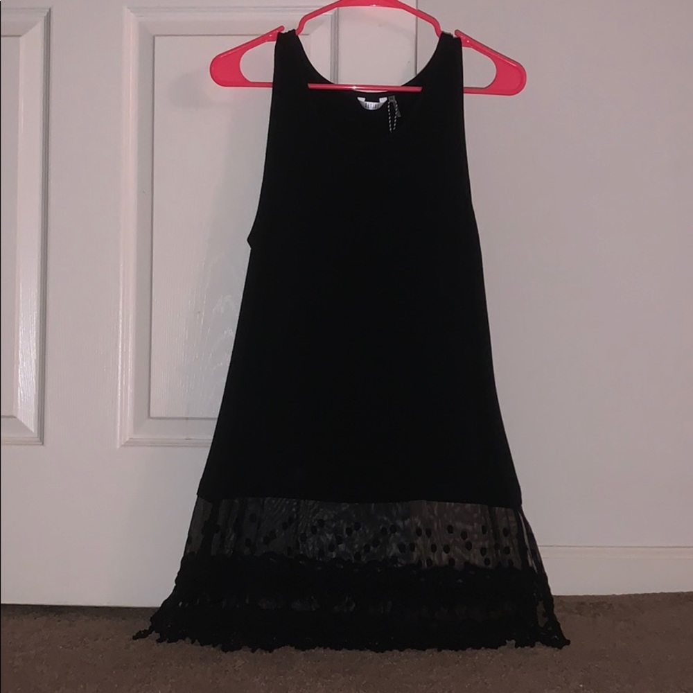 Long black shirt with lace on bottom